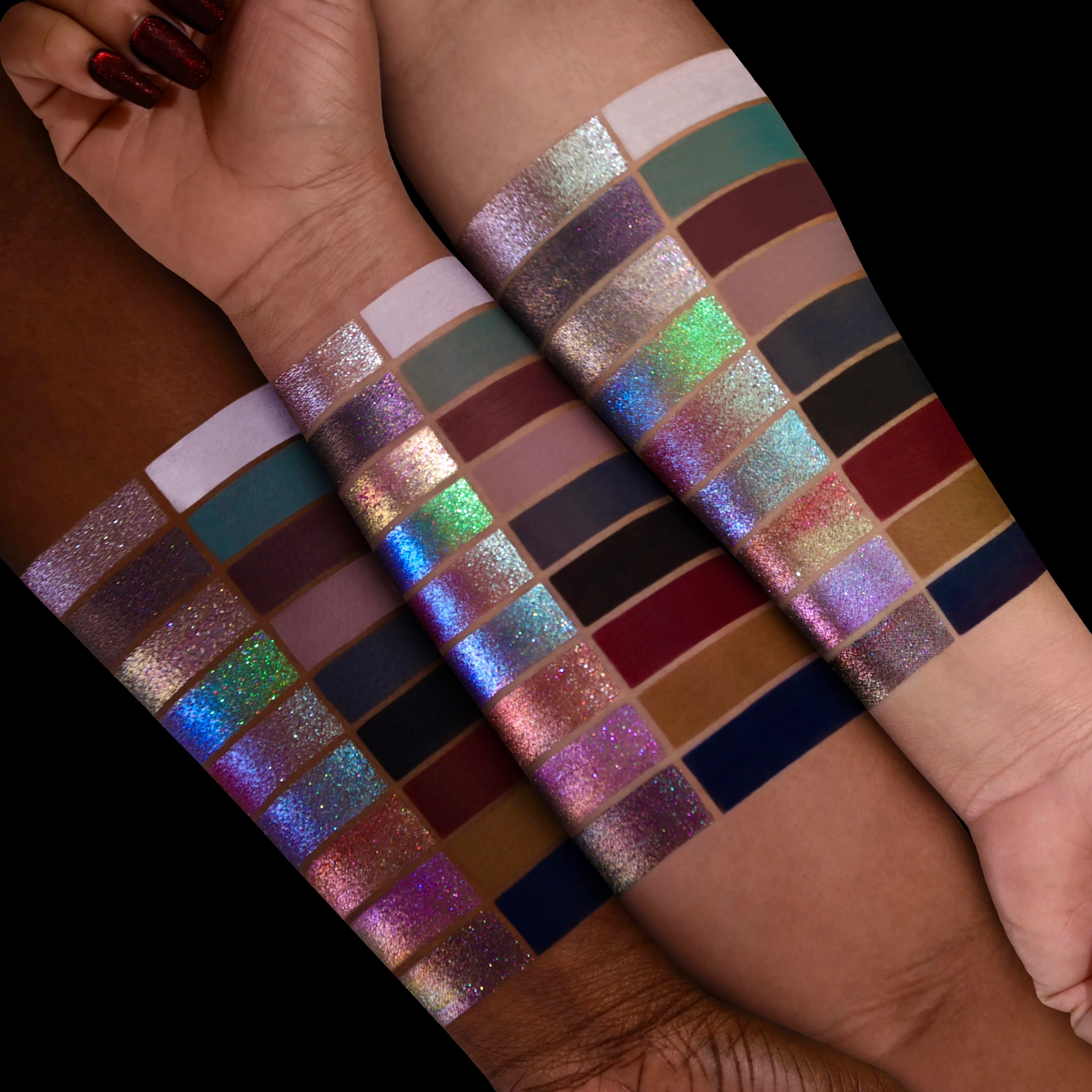 All 18 Simply Meant To Be eyeshadows swatched on light, medium and deep skin tones, with matte and sparkling multichrome finishes against black.