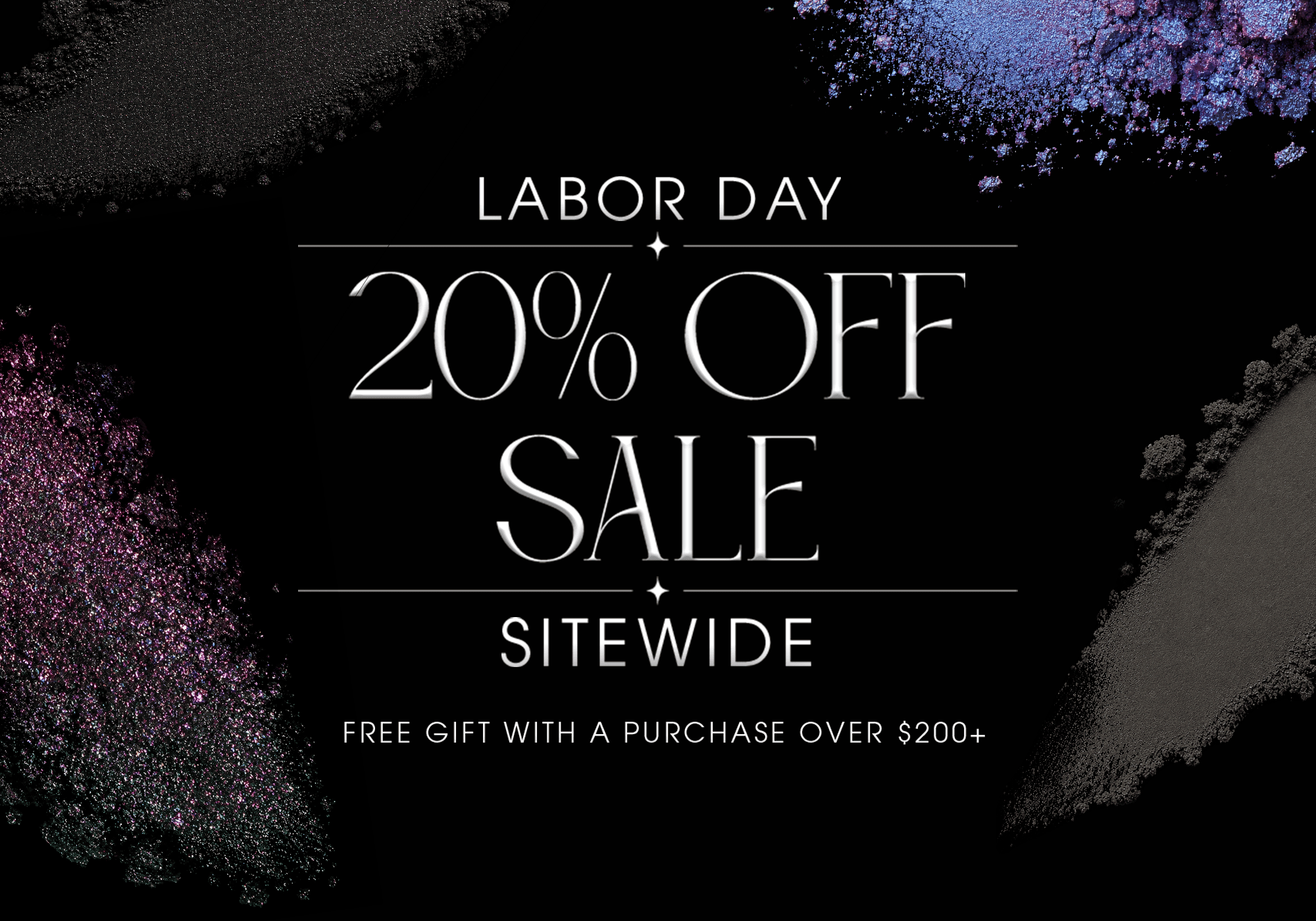 Labor Day 20% Off Sale Sitewide. Free gift with a purchase over $200+. Text set against a black background scattered with shimmering purple, blue, and pink cosmetic powder pigments.