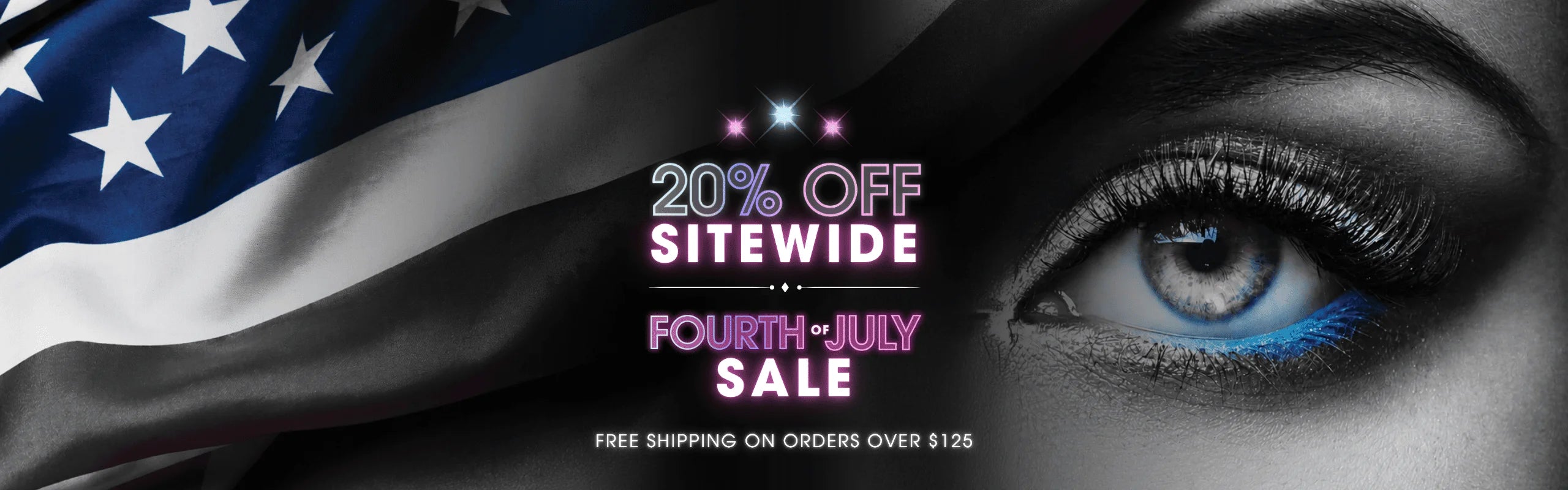 A close-up of an eye with blue makeup against a grayscale American flag. "Fourth of July Sale" in neon colors. Text: 20% off sitewide, free shipping over $125.
